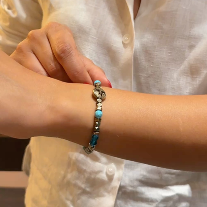 Cleopatra Bileklik – 7 Çakra Swarovski ve Doğal Taşlar (Turkuaz, Akuamarin, Hematit)