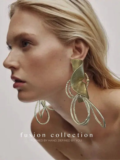 Fusion Heykelsi Küpe